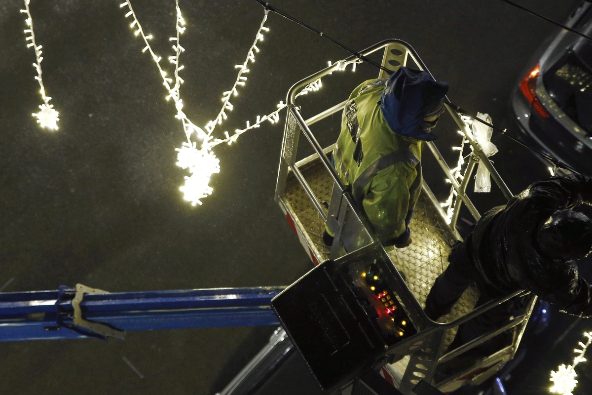 Christmas lights installation services in Hydra, ID on a cozy home exterior